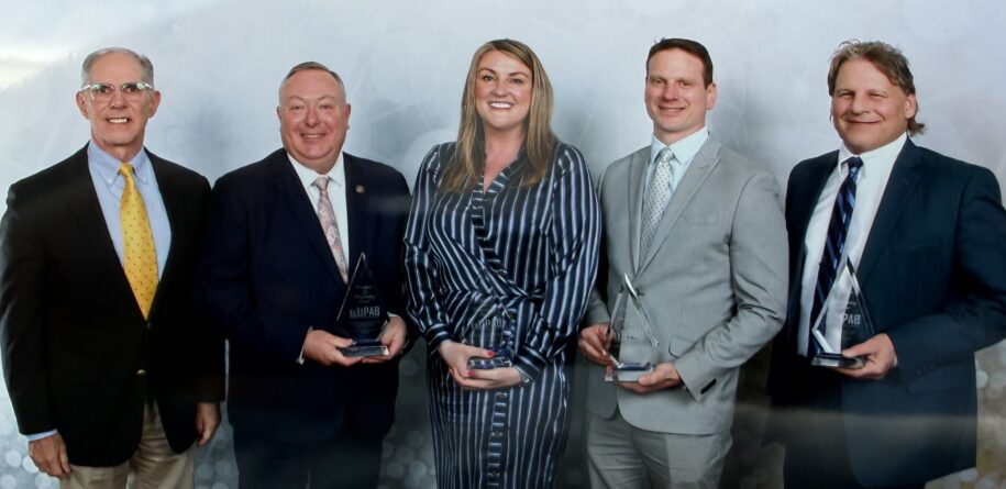Group receiving Excellence in Broadcasting Award